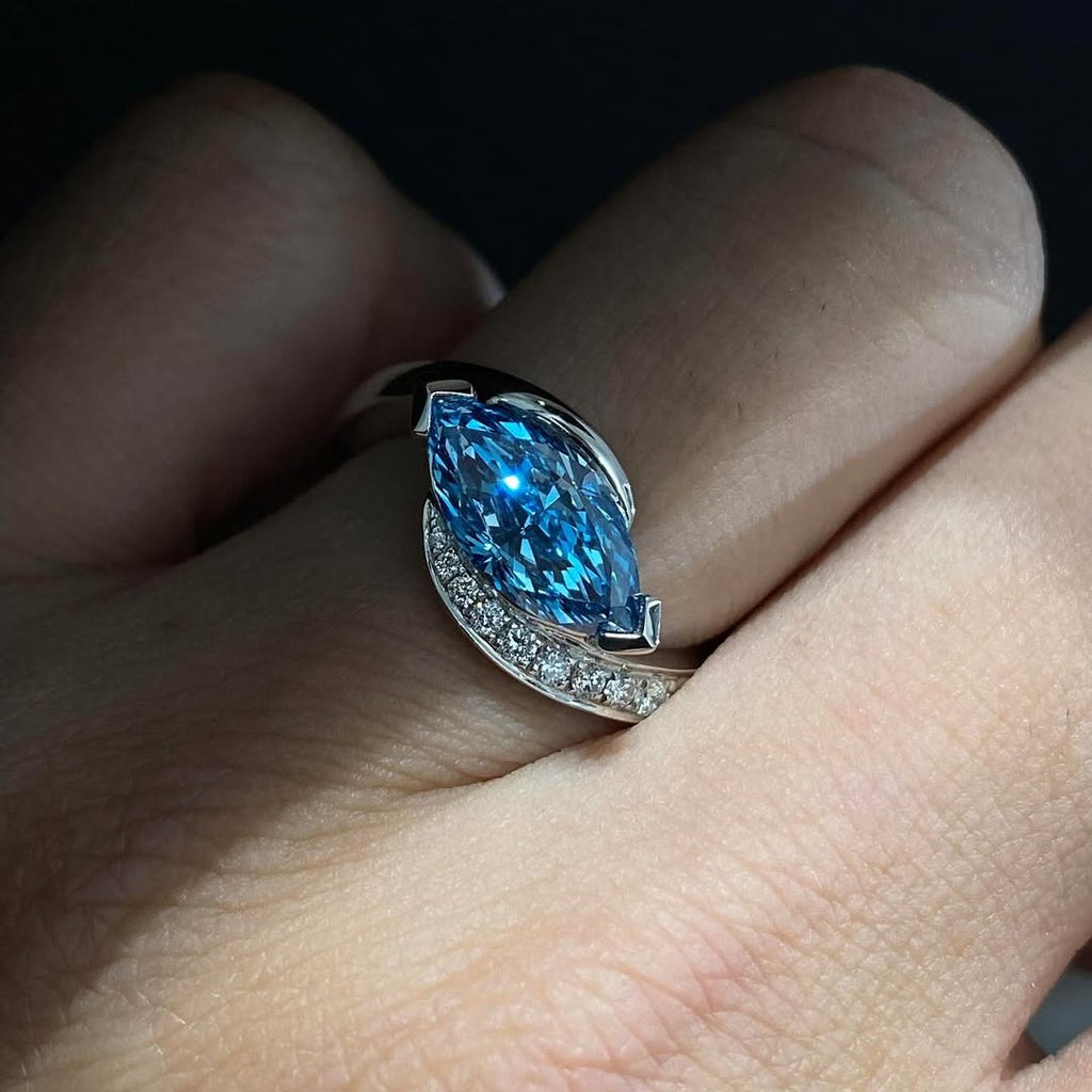 Blue Marquise Cut Halo Twist Style Engagement Ring | Lab Grown Diamond | 14K Yellow Gold