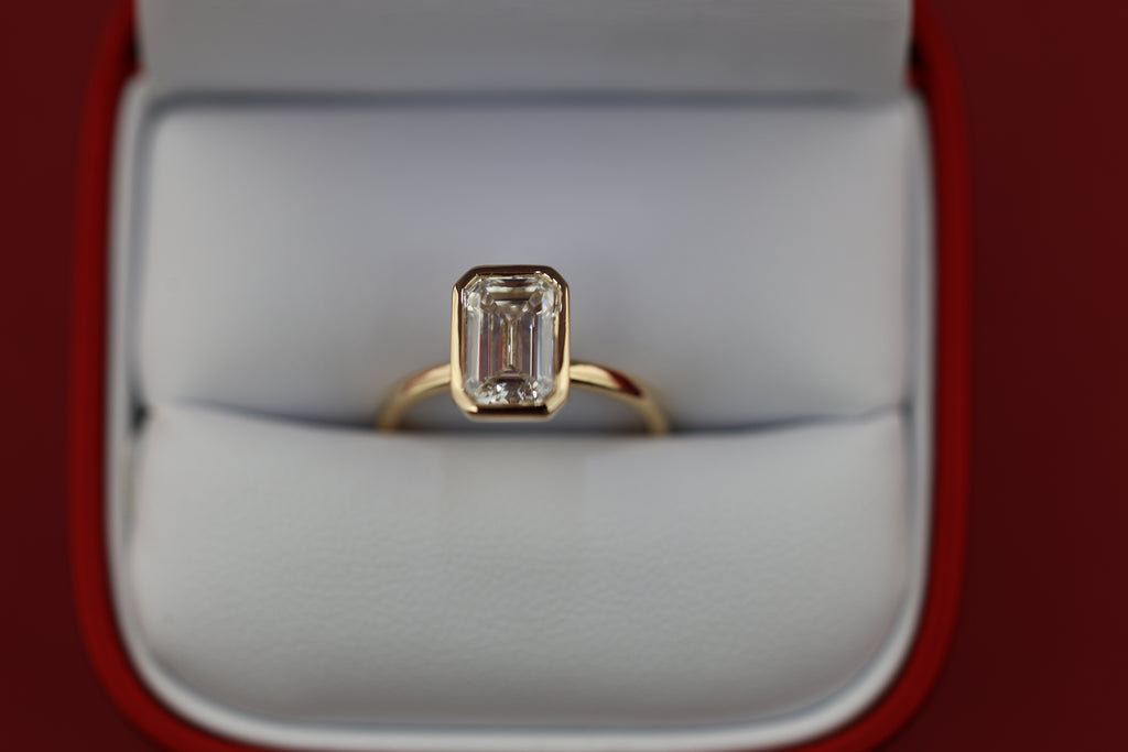 Modern Emerald Engagement Ring | Lab Grown Diamond | 14K Yellow Gold Bezel Solitaire Ring