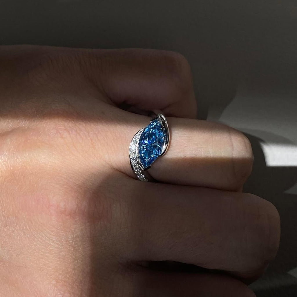 Blue Marquise Cut Halo Twist Style Engagement Ring | Lab Grown Diamond | 14K Yellow Gold