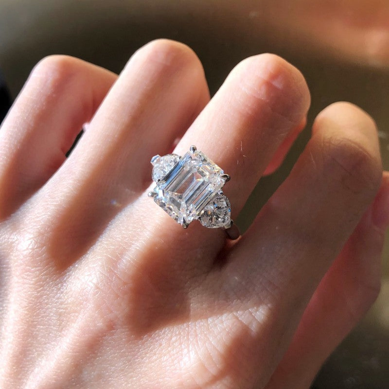 Emerald Cut Three Stone Ring Heart Shape Side Stones | Lab Grown Diamond | 14K Yellow Gold