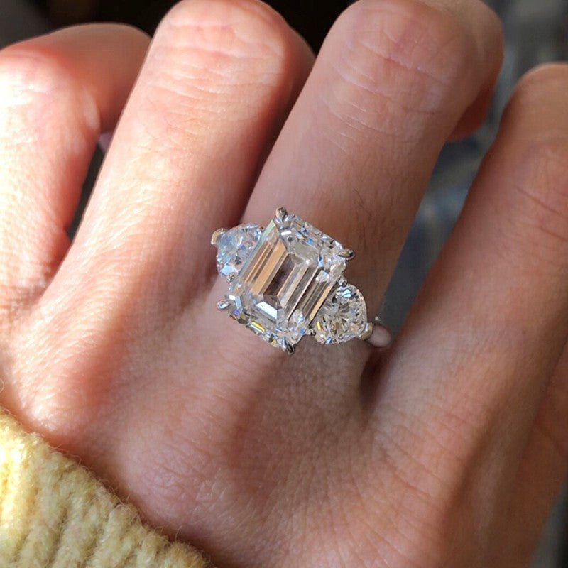 Emerald Cut Three Stone Ring Heart Shape Side Stones | Lab Grown Diamond | 14K Yellow Gold