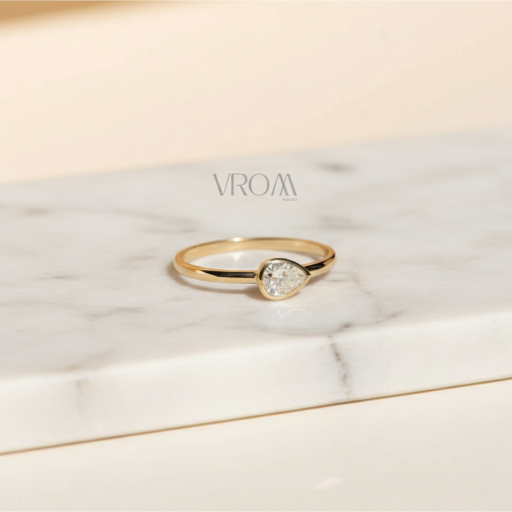 East West Pear Bezel Set Solitaire Ring | Lab Grown Diamond | 14K Yellow Gold Minimalist