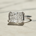 Modern East West Radiant Engagement Ring | Lab Grown Diamond | 14K Yellow Gold Half Bezel