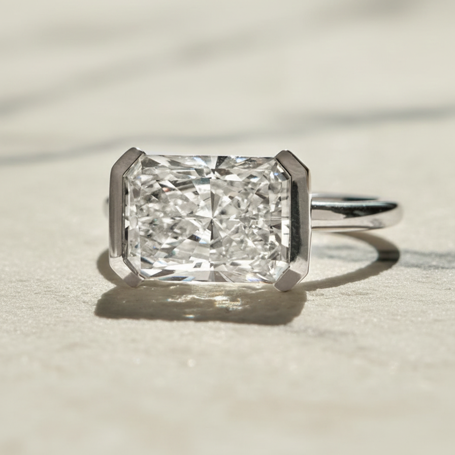 Modern East West Radiant Engagement Ring | Lab Grown Diamond | 14K Yellow Gold Half Bezel