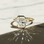 Radiant 3 Stone Engagement Ring with Pear Accent Half Bezel | Lab Grown Diamond | 14K Yellow Gold