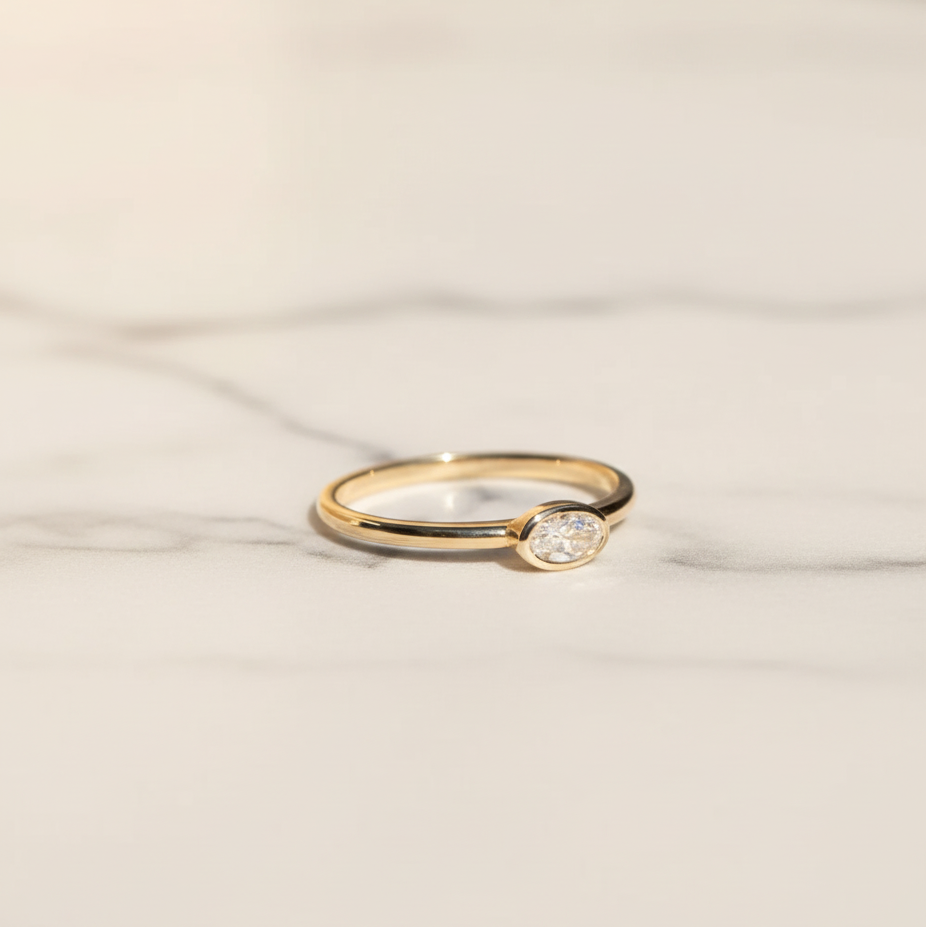 Minimalist Oval East West Bezel Set Solitaire Ring | Lab Grown Diamond | 14K Yellow Gold