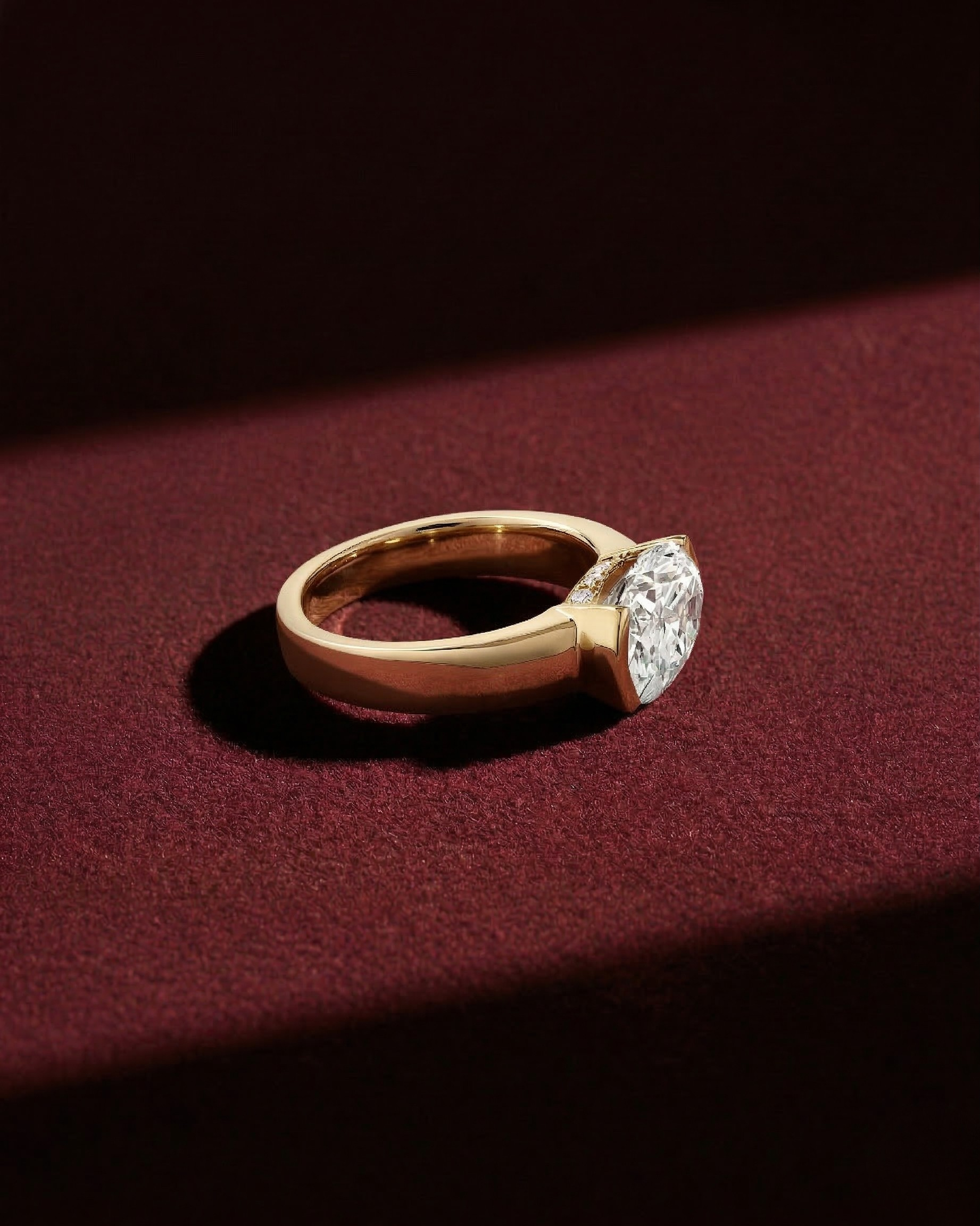 Oval Lab Diamond East-West Half Bezel Ring