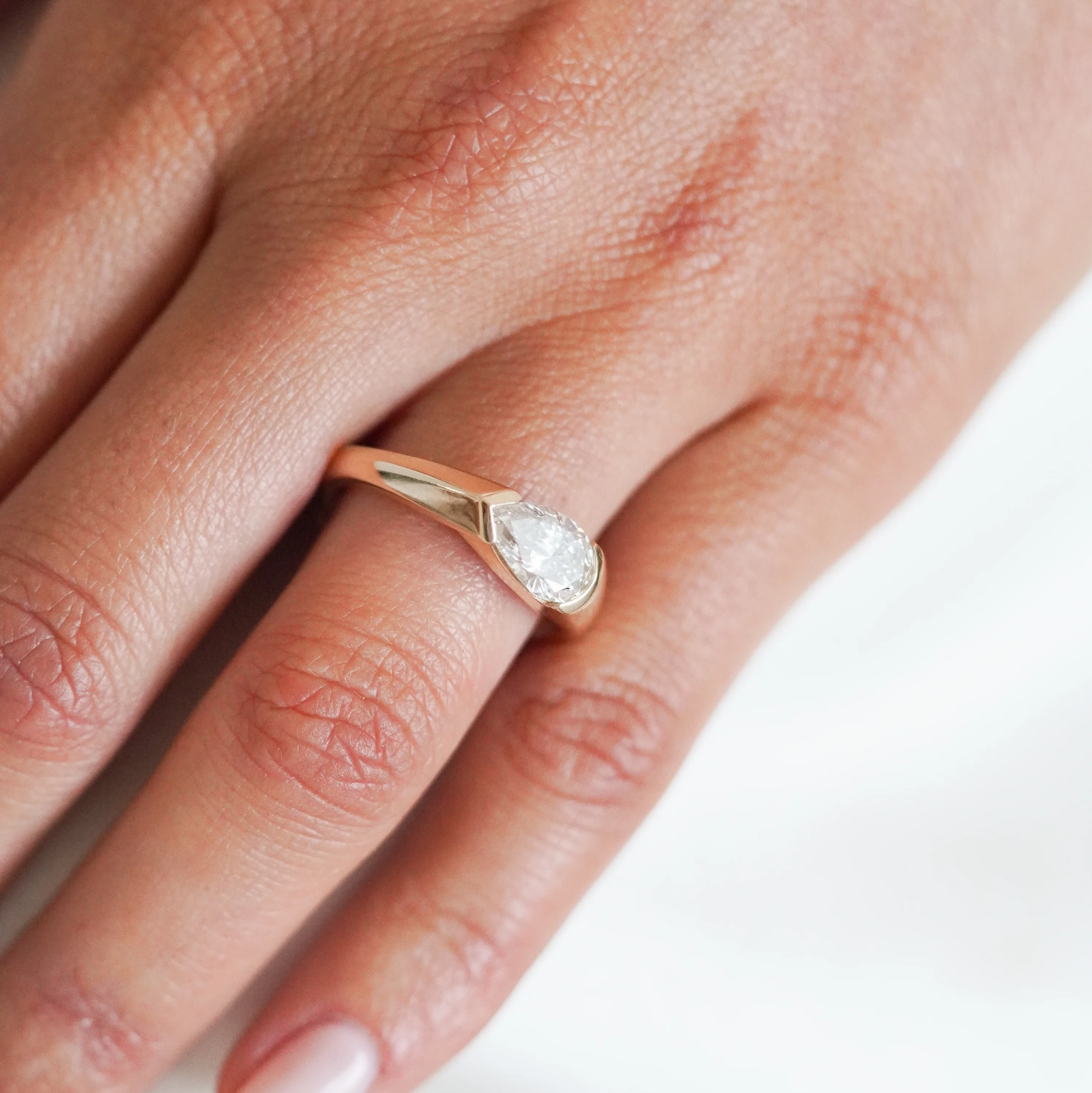 East West Half Bezel Pear Engagement Ring | Lab Grown Diamond | 14K Yellow Gold Modern Solitaire