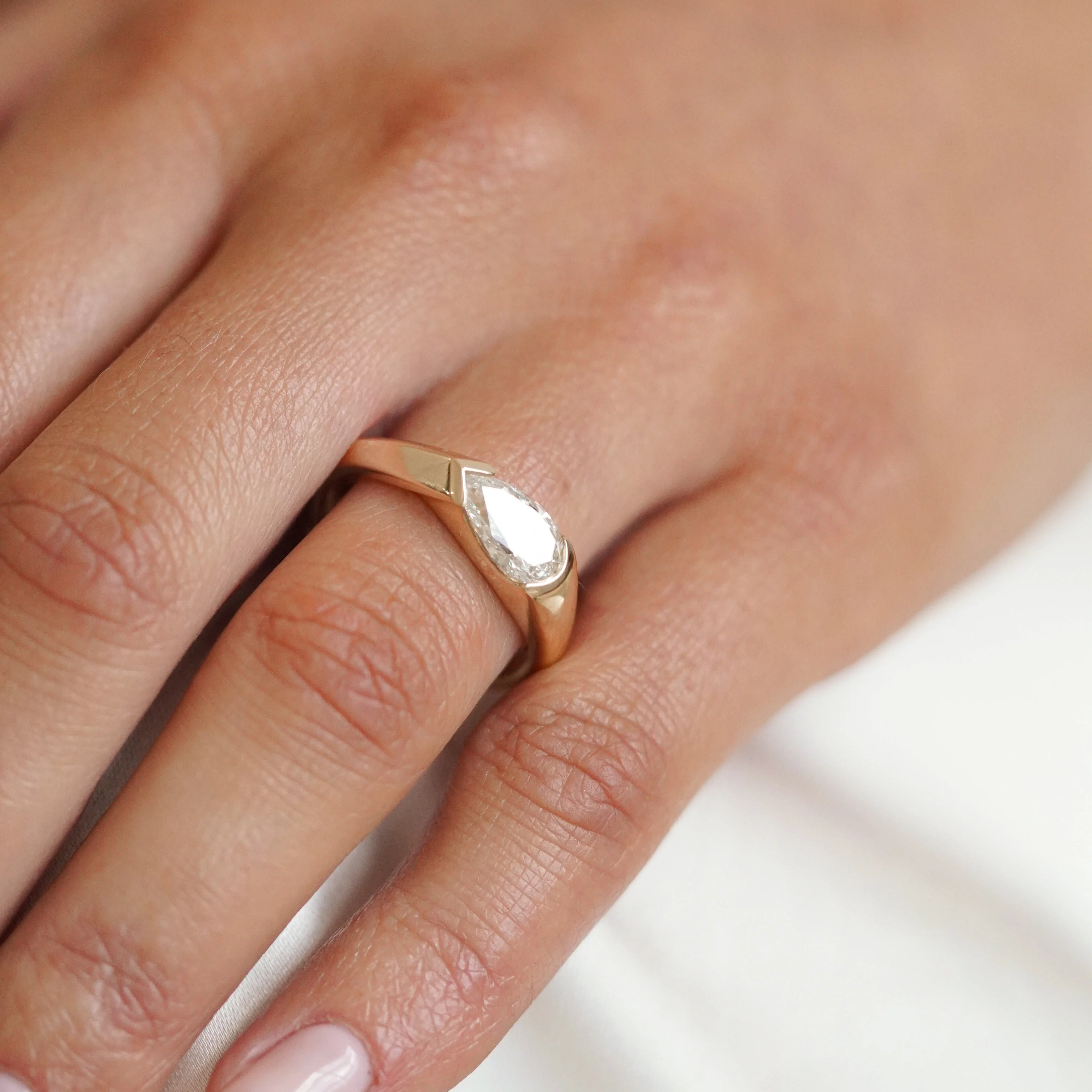 East West Half Bezel Pear Engagement Ring | Lab Grown Diamond | 14K Yellow Gold Modern Solitaire