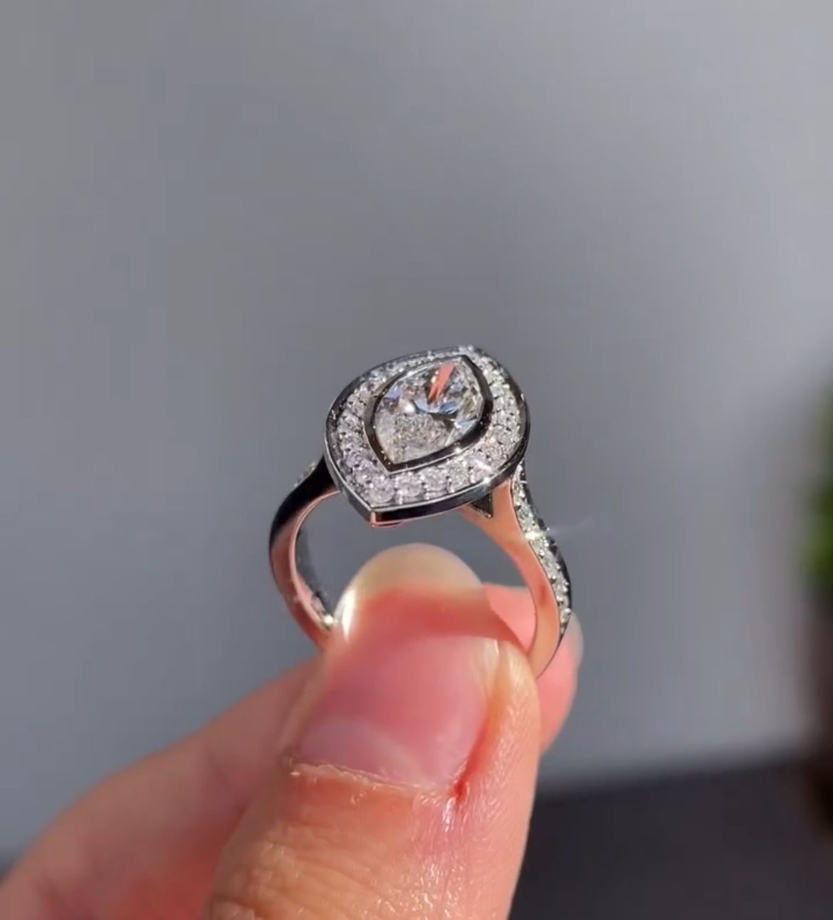 Elegant Marquise Lab Grown Diamond Bezel Set Halo Engagement Ring