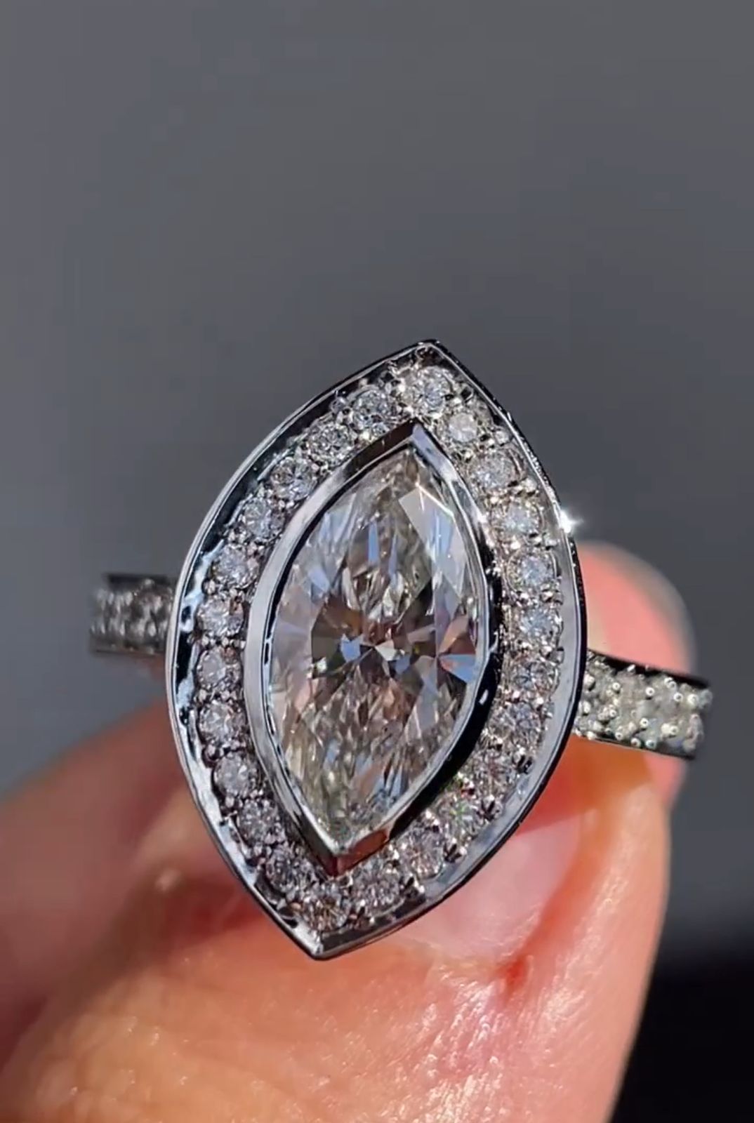 Elegant Marquise Lab Grown Diamond Bezel Set Halo Engagement Ring