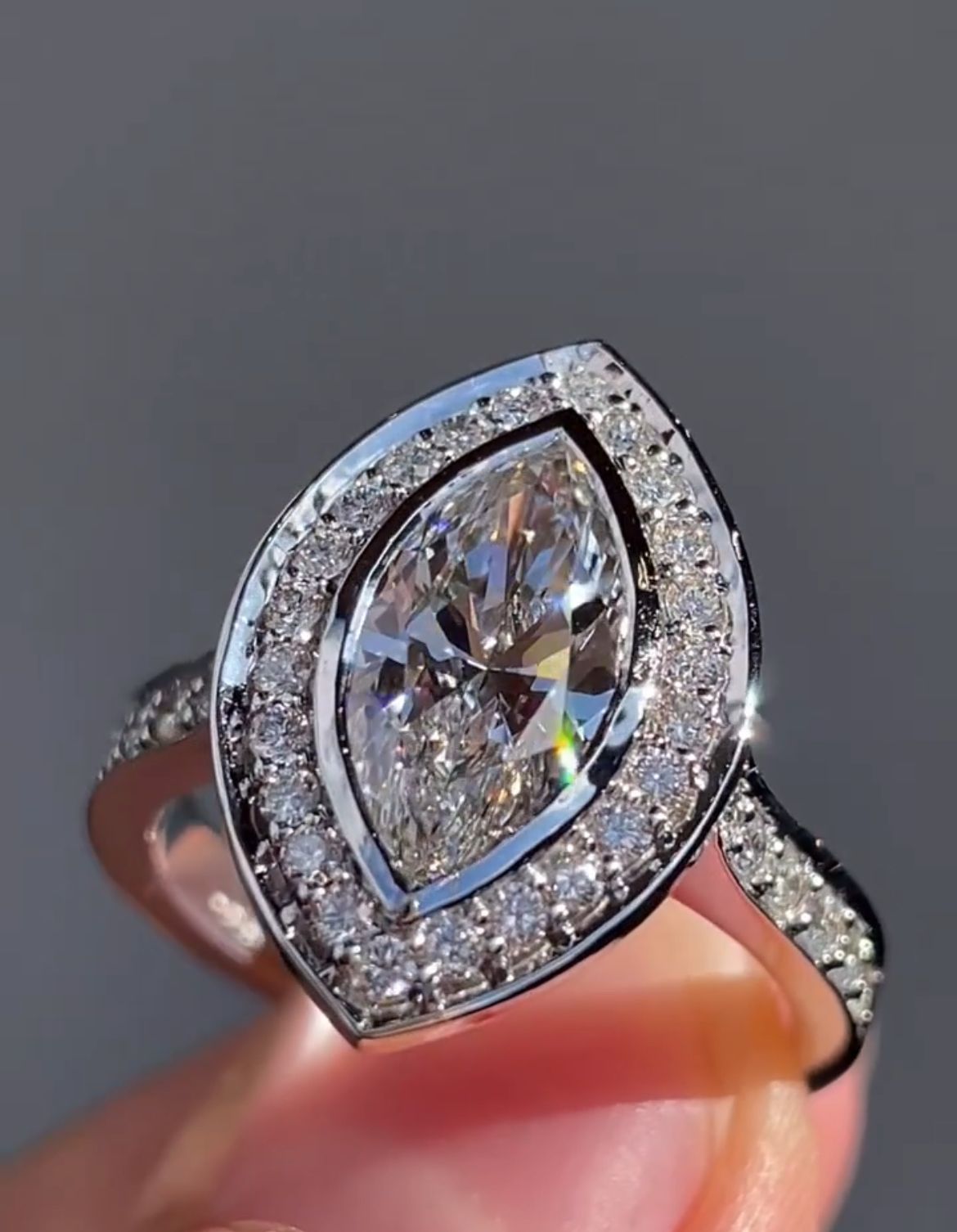 Elegant Marquise Lab Grown Diamond Bezel Set Halo Engagement Ring